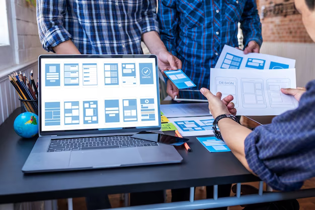 Designers working in a collaborative workroom